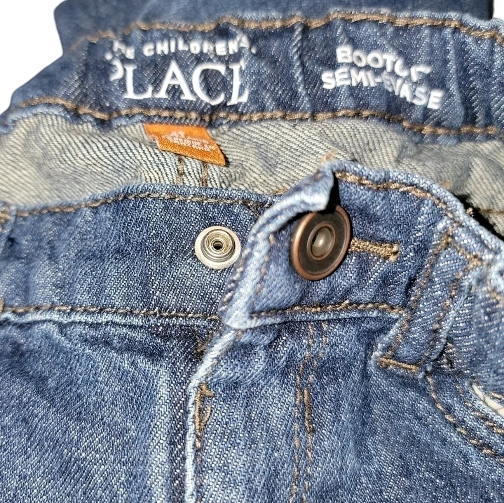The children’s place size 4T blue jeans snap button, adjustable waist
